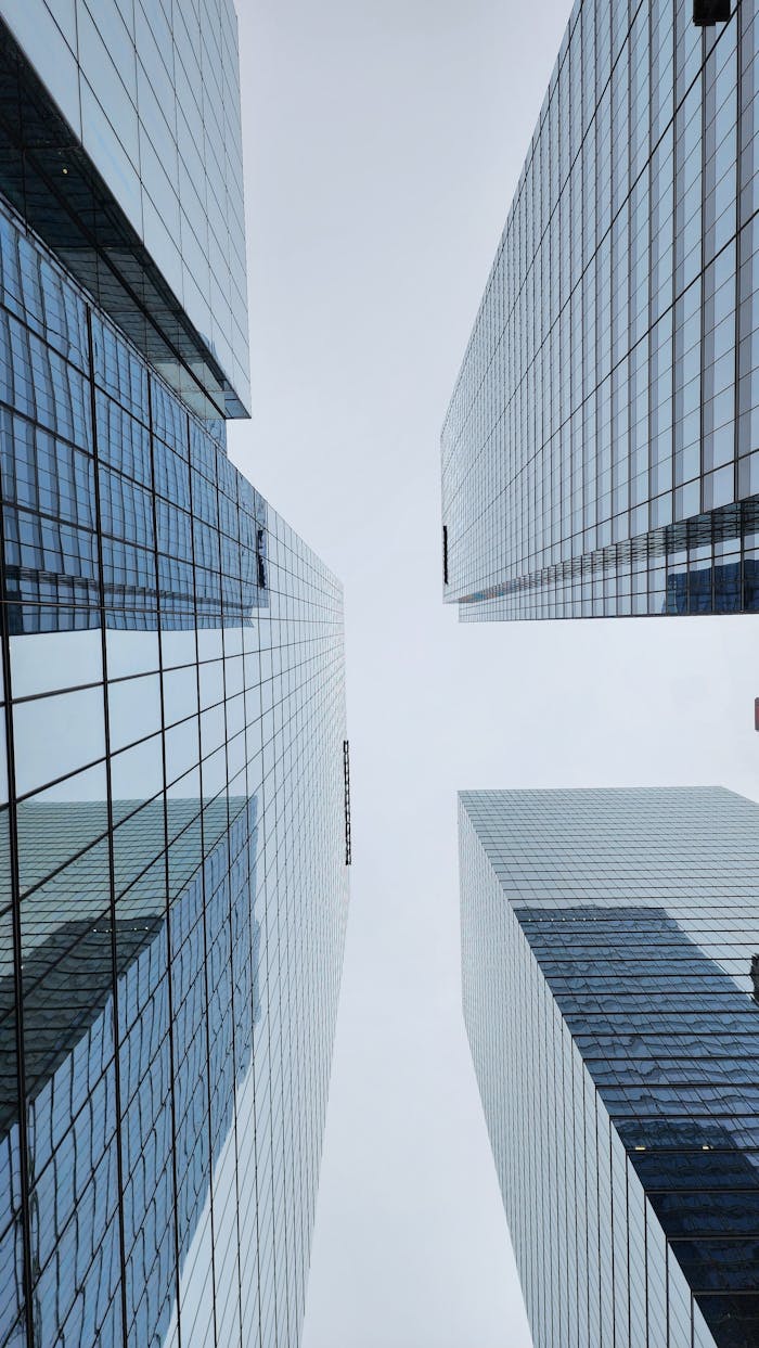 Dramatic low angle view of Toronto skyscrapers showcasing modern architecture.